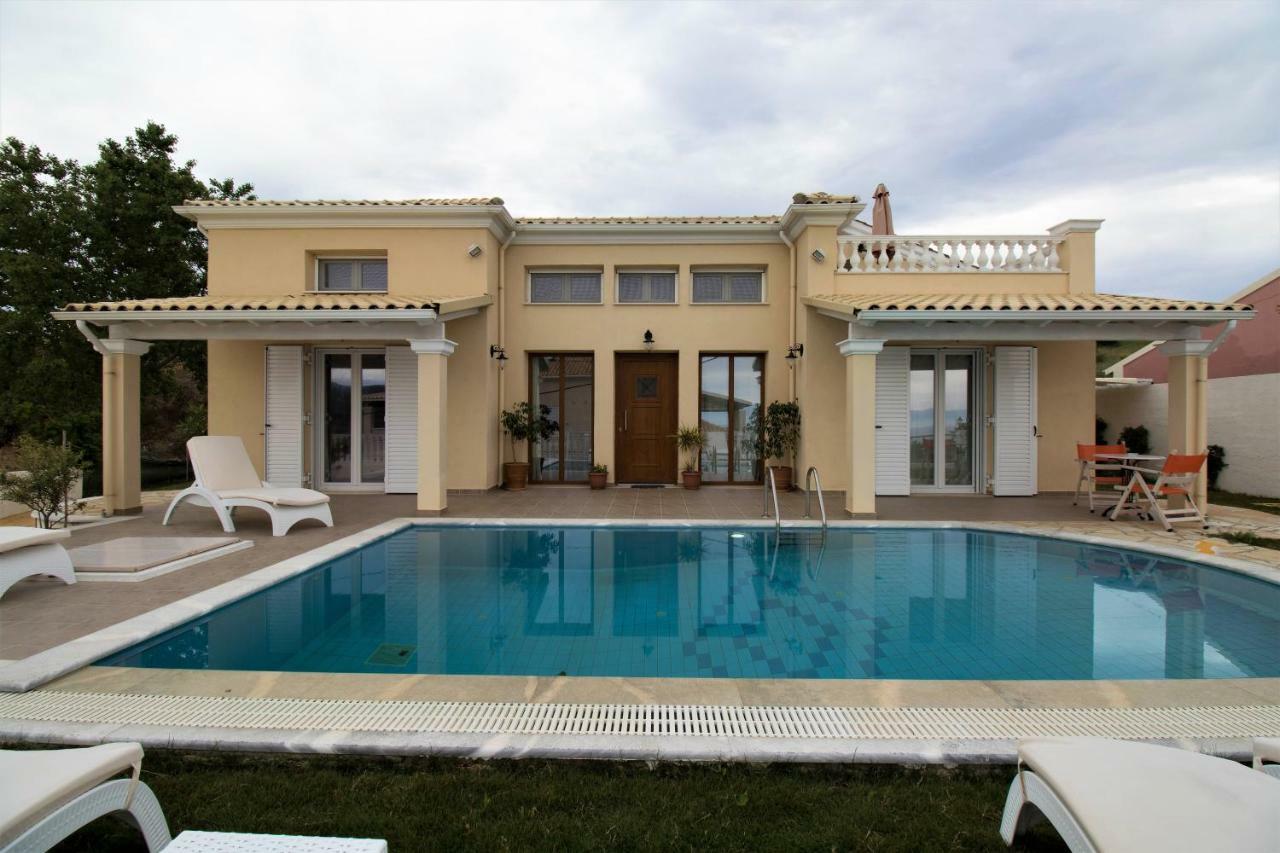 Villa De La Mer Агиос Стефанос Экстерьер фото